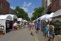 Folks enjoying the The Guild Summer Art fair on Main St.