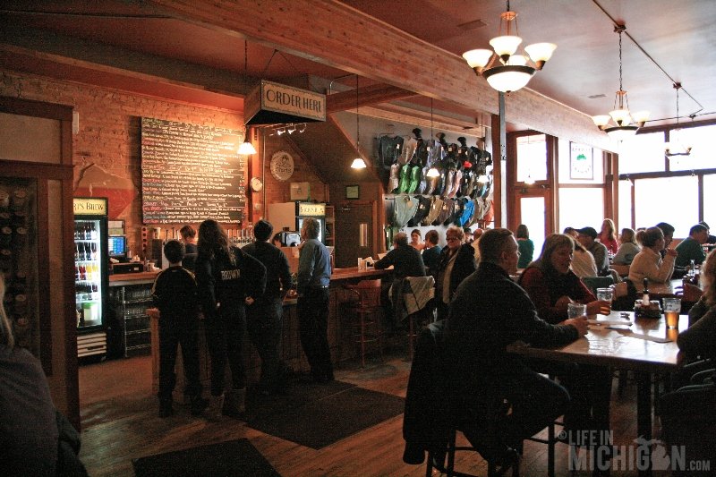 The busy and friendly staff taking orders at the bar at Shorts