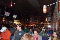 Folks enjoying food and beer at Mackinaw Brewing Company in Traverse City