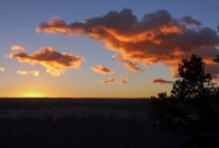 Sun peaking out on Pink Clouds at the North Rim