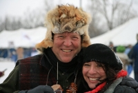 Enjoying the antics on the sledding hill