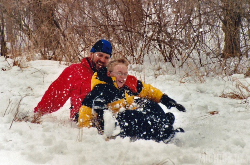 Chuck and Shea sledding