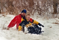 Chuck and Shea sledding