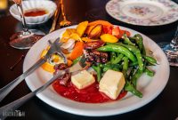 Strega Nonna - marinated white anchovies, grilled octopus (the signature dish), cheese with local jam, and an assortment of marinated vegetables and quail eggs.