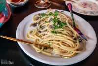Strega Nonna - Bucatini with local mushrooms with butter and parmesan garnished with fresh basil