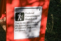 Government shutdown signs on the Hop Valley trail head