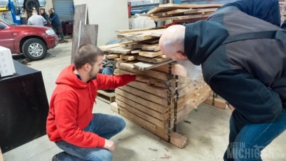 Eric demonstrates how they use a hydrometer to measure the moisture content of the wood
