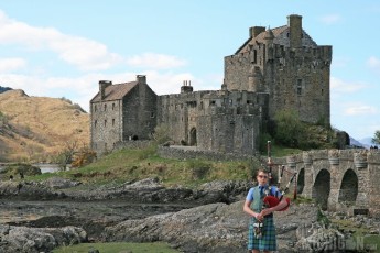 Eilean Donan Castle, Scotland with Bagpiper