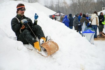 Sledding on the snow hill at the beer fest