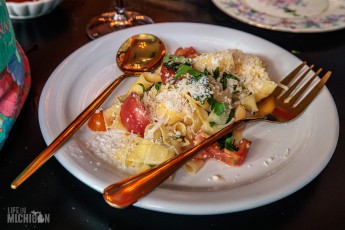 Strega Nonna - Homemade tagliatelle with local tomatoes and garlic with butter and parmesan garnished with fresh basil